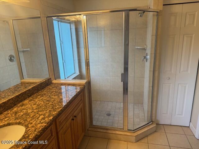 3718 Chambers Lane, Unit 2 Cocoa, FL 32926 - Photo 15 of 20 a bathroom with a granite countertop shower and a sink