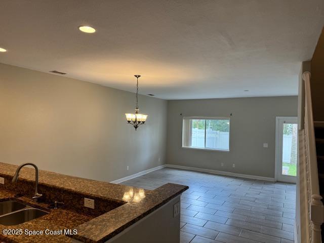3718 Chambers Lane, Unit 2 Cocoa, FL 32926 - Photo 3 of 20 a room with a sink and a window