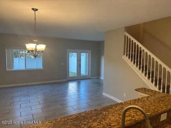a view of a livingroom with wooden floor