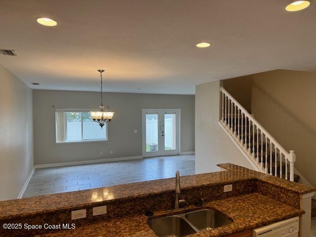 3718 Chambers Lane, Unit 2 Cocoa, FL 32926 - Photo 5 of 20 a view of an empty room with wooden floor and a window
