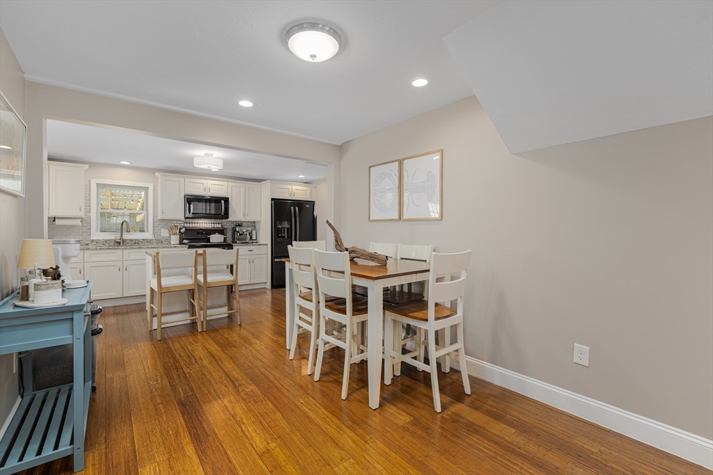 69 Denver Street Fall River, MA 02721 - Photo 24 of 35 a dining room with furniture and wooden floor