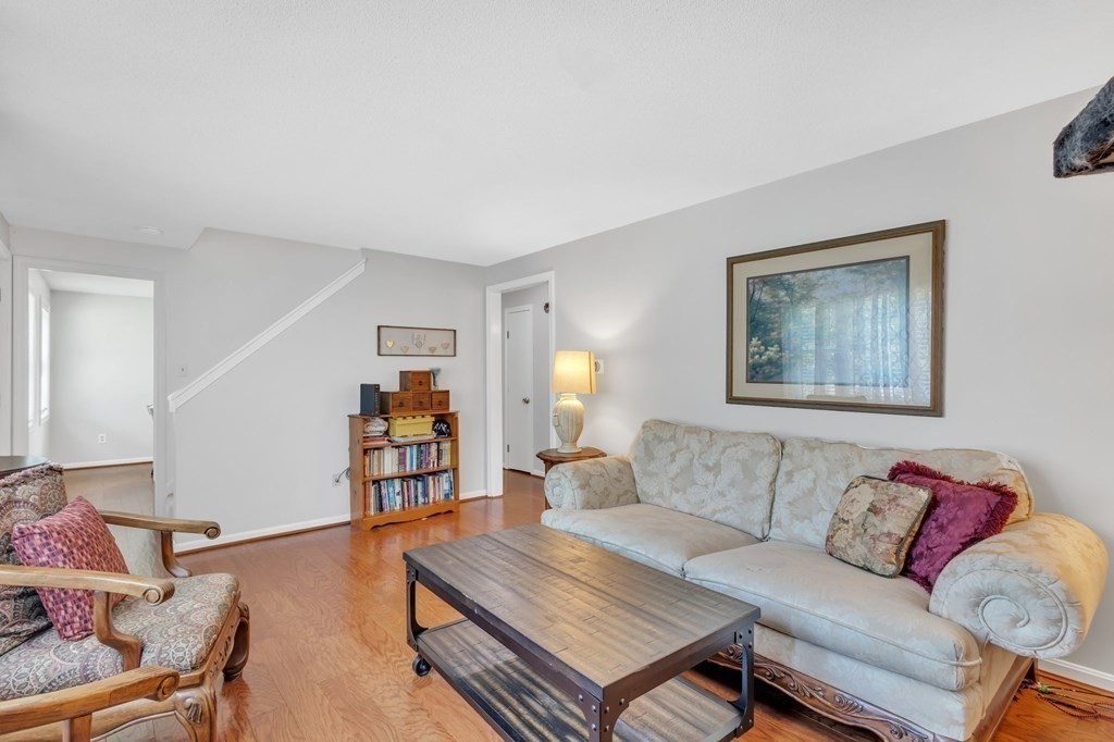 1638 Parker Street Springfield, MA 01128 - Photo 11 of 36 a living room with furniture and a couch