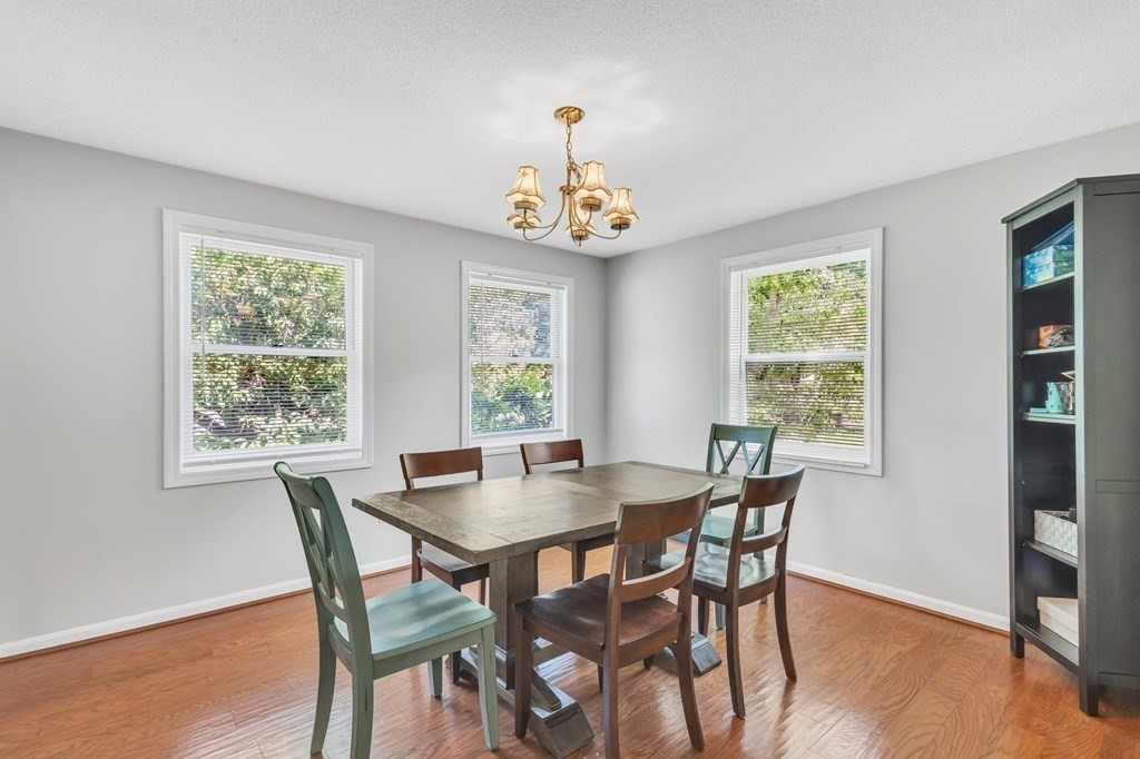 1638 Parker Street Springfield, MA 01128 - Photo 13 of 36 a view of a dining room with a table and chairs