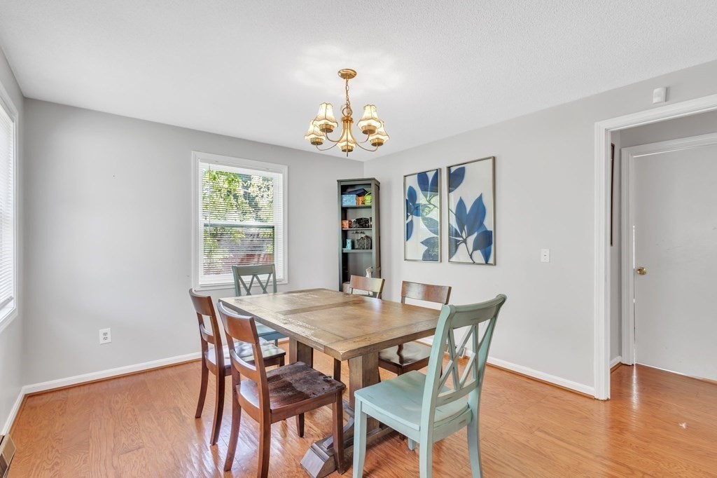1638 Parker Street Springfield, MA 01128 - Photo 14 of 36 a view of a dining room with furniture window and wooden floor