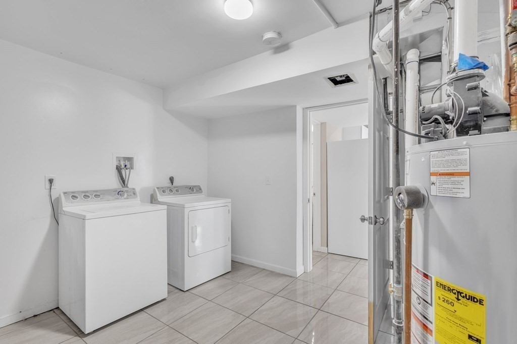 1638 Parker Street Springfield, MA 01128 - Photo 25 of 36 a utility room with dryer and washer