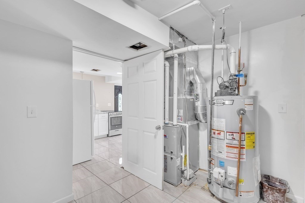 1638 Parker Street Springfield, MA 01128 - Photo 26 of 36 a bathroom with a shower and a sink