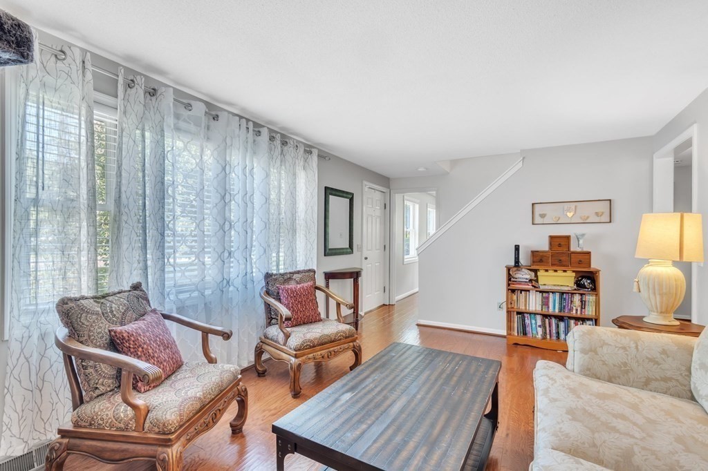 1638 Parker Street Springfield, MA 01128 - Photo 10 of 36 a living room with furniture and wooden floor