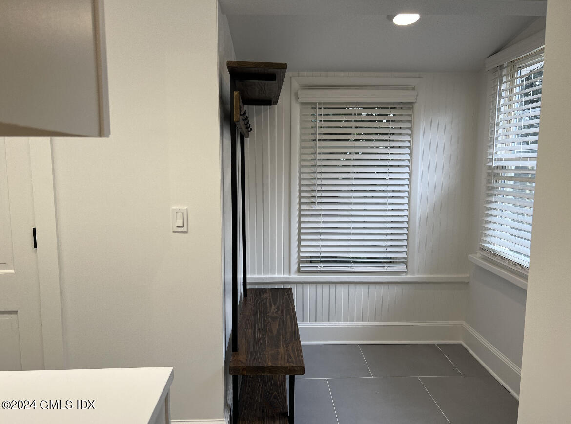 45 Bible Street, Unit 2 Cos Cob, CT 06807 - Photo 12 of 12 a bathroom with a bathtub and a window