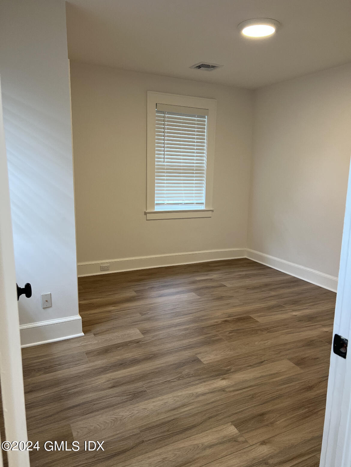 45 Bible Street, Unit 2 Cos Cob, CT 06807 - Photo 10 of 12 wooden floor in an empty room