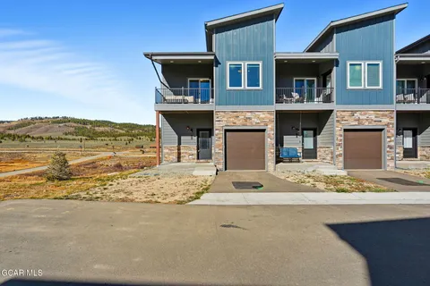 a view of house with wooden floor and outdoor space