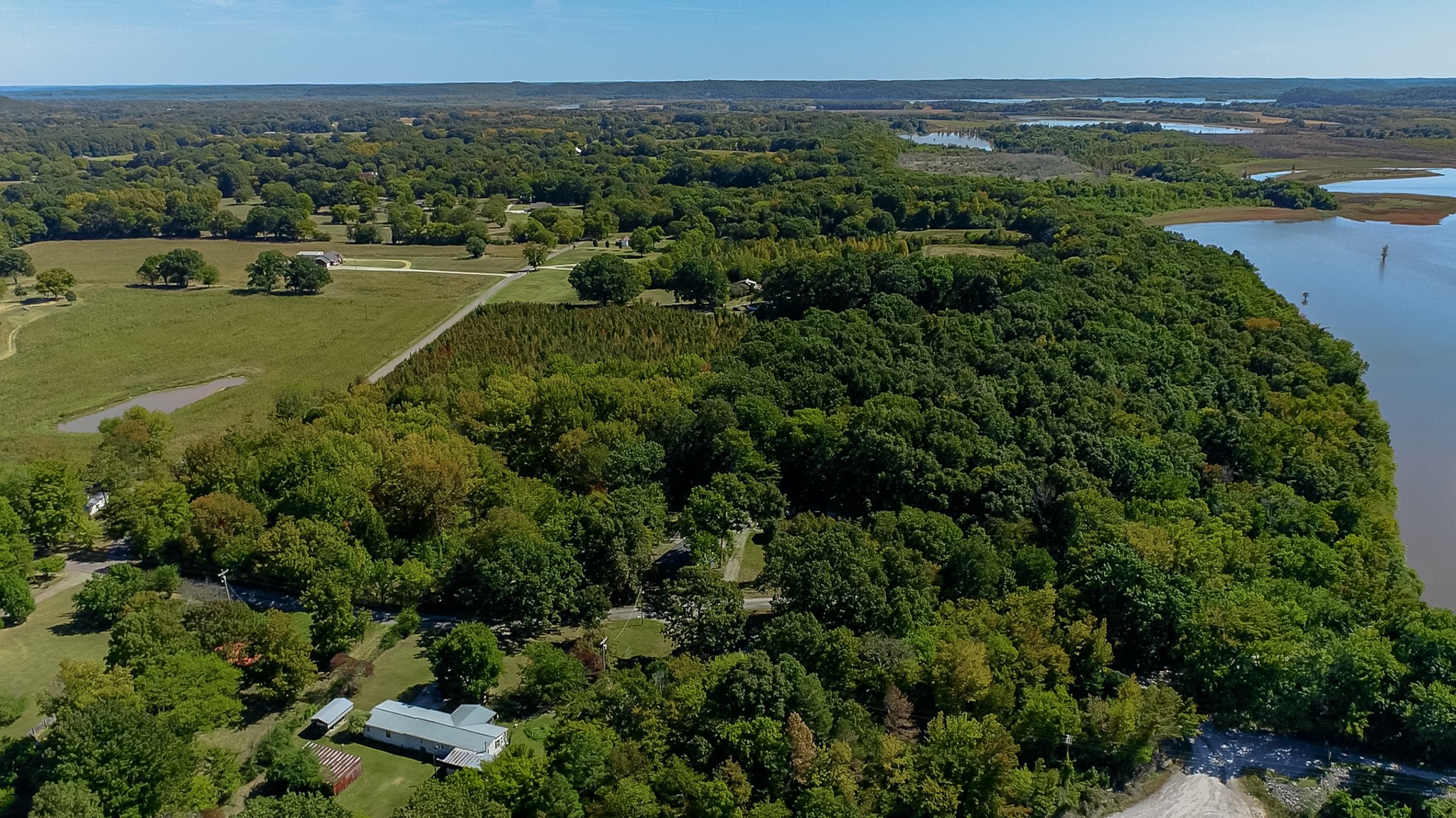 0 Pump Station Road New Johnsonville, TN 37134 - Photo 30 of 34 an aerial view of a houses with a lake view