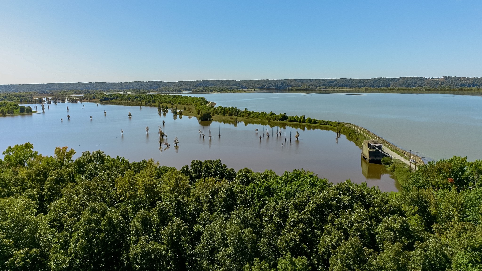 0 Pump Station Road New Johnsonville, TN 37134 - Photo 5 of 34 a view of a lake with houses in the back