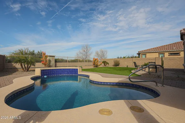 a front view of house with yard slide and outdoor seating