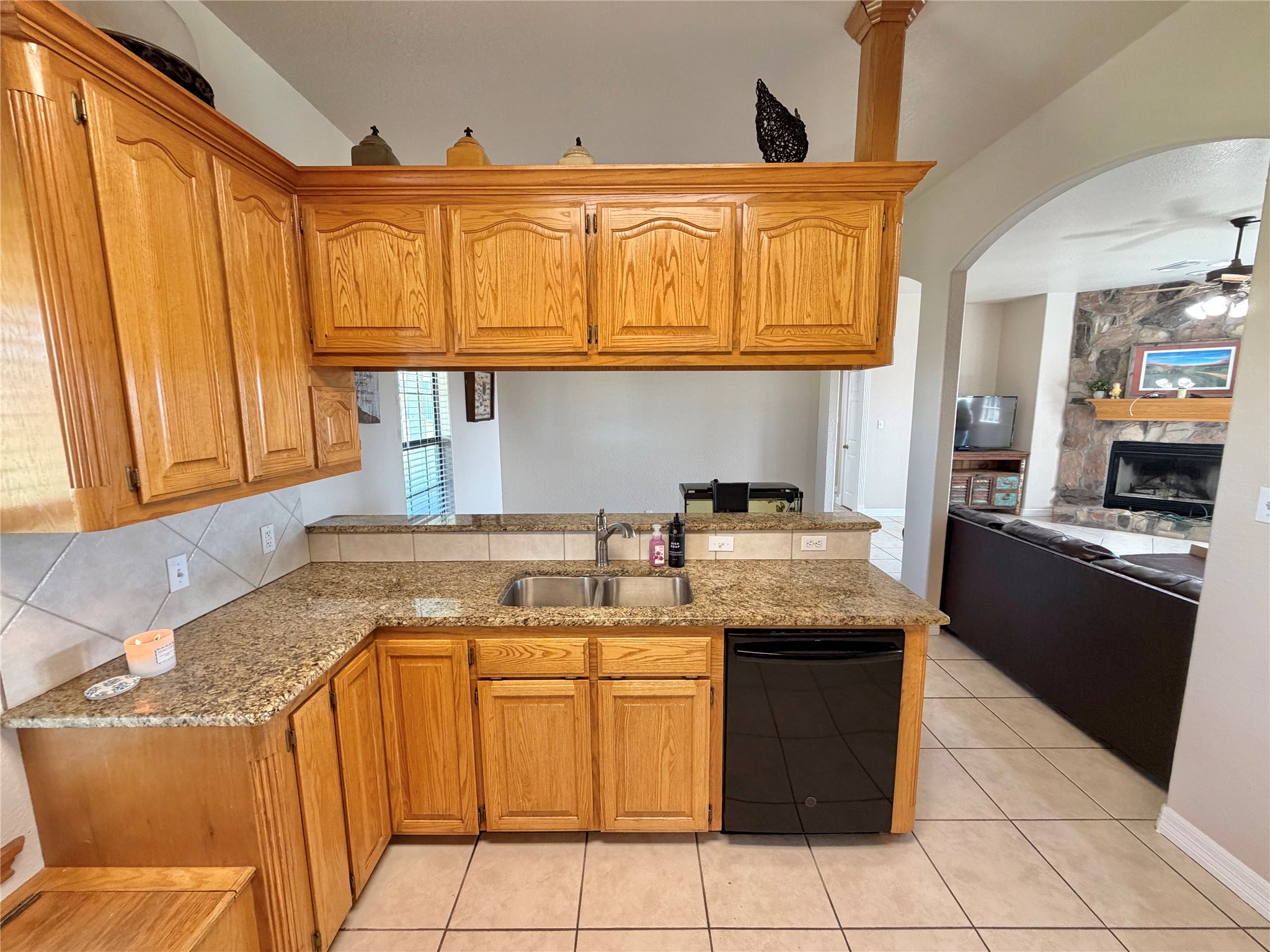 15903 County Road 621 Angleton, TX 77515 - Photo 13 of 33 a kitchen with stainless steel appliances granite countertop a sink stove and cabinets