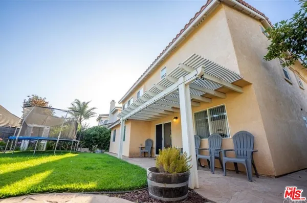 a view of a backyard with a garden