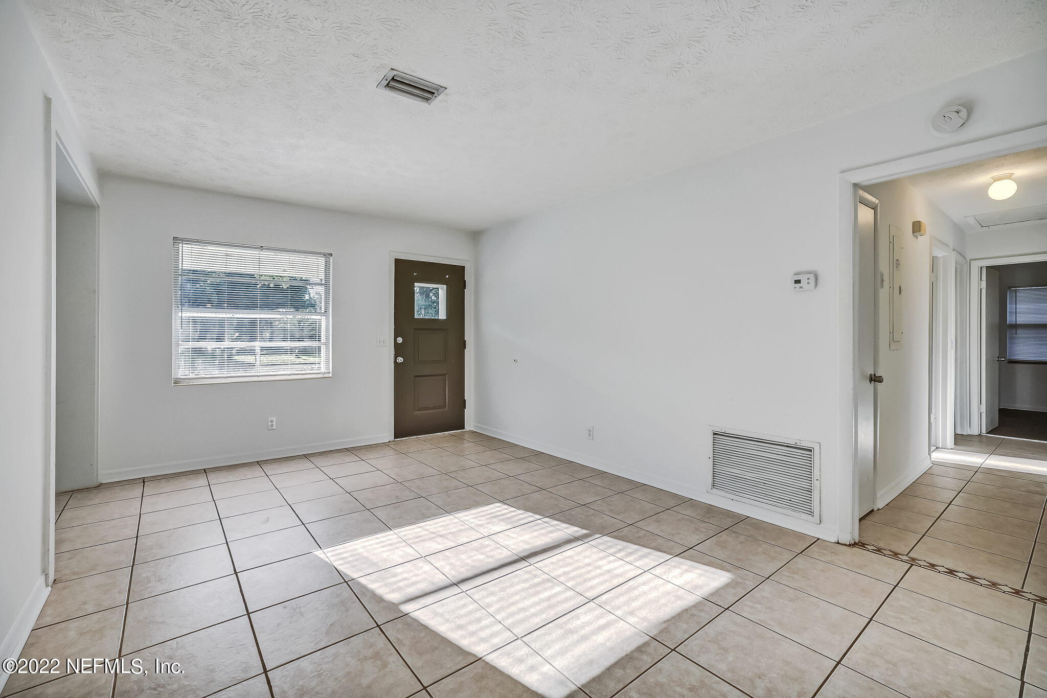 5466 Community Road Jacksonville, FL 32207 - Photo 8 of 31 a view of an empty room and window