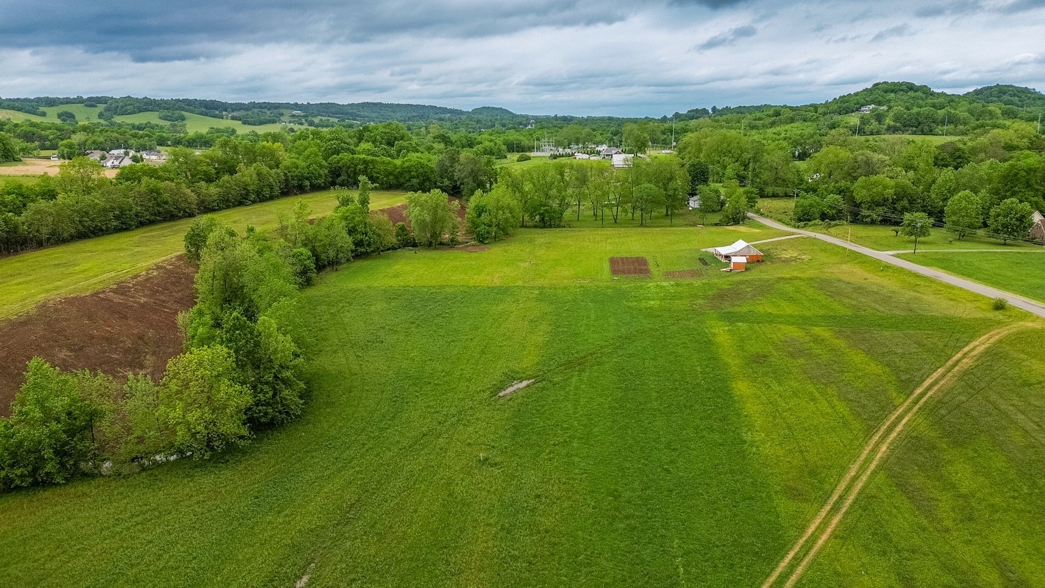 0 Ostella Road Cornersville, TN 37047 - Photo 24 of 37 a view of an outdoor space and a yard