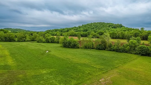 a view of a lake with a big yard