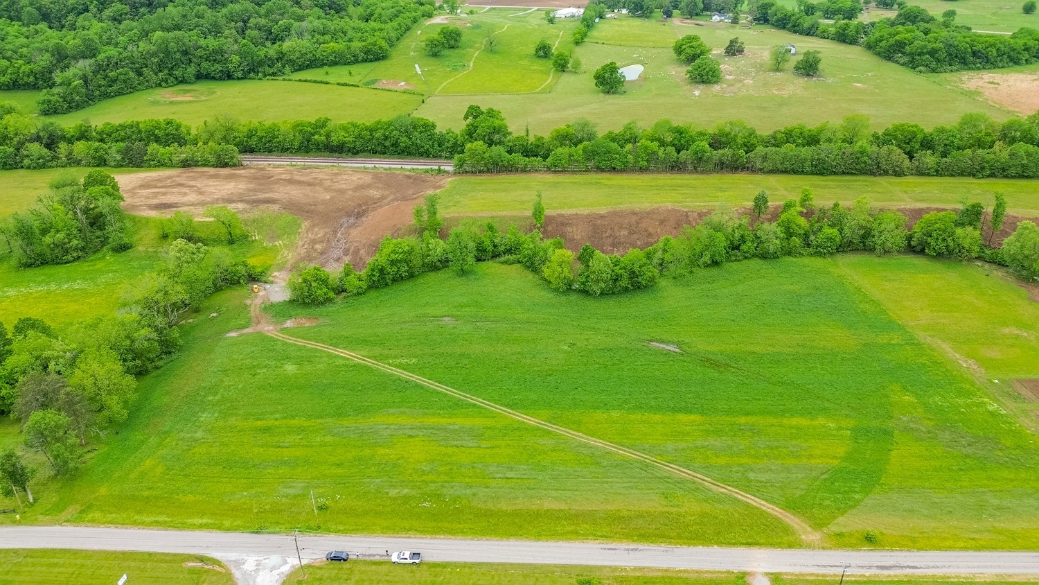 0 Ostella Road Cornersville, TN 37047 - Photo 26 of 37 a view of a lake with a big yard