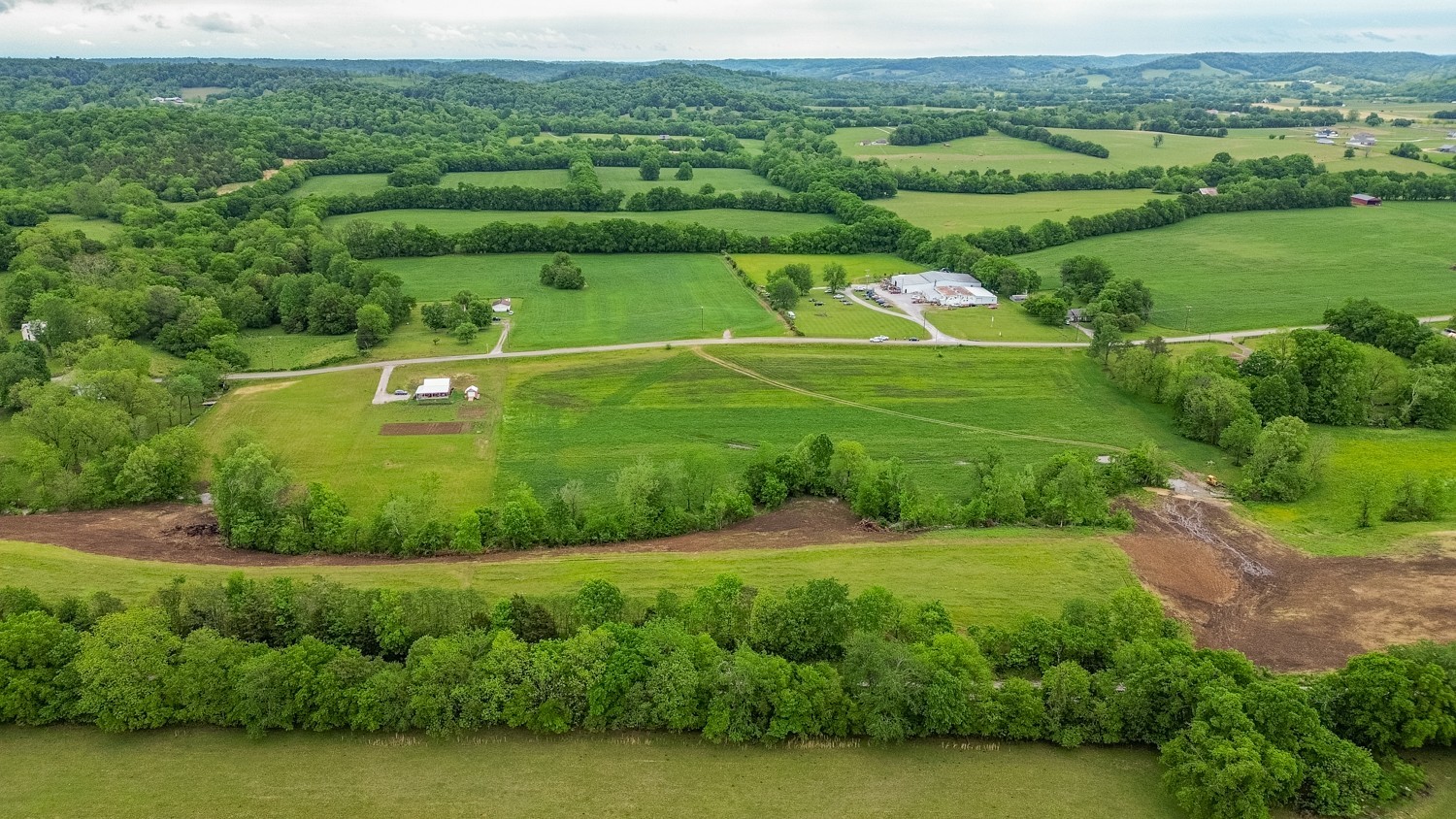 0 Ostella Road Cornersville, TN 37047 - Photo 37 of 37 a view of a golf course with a lake