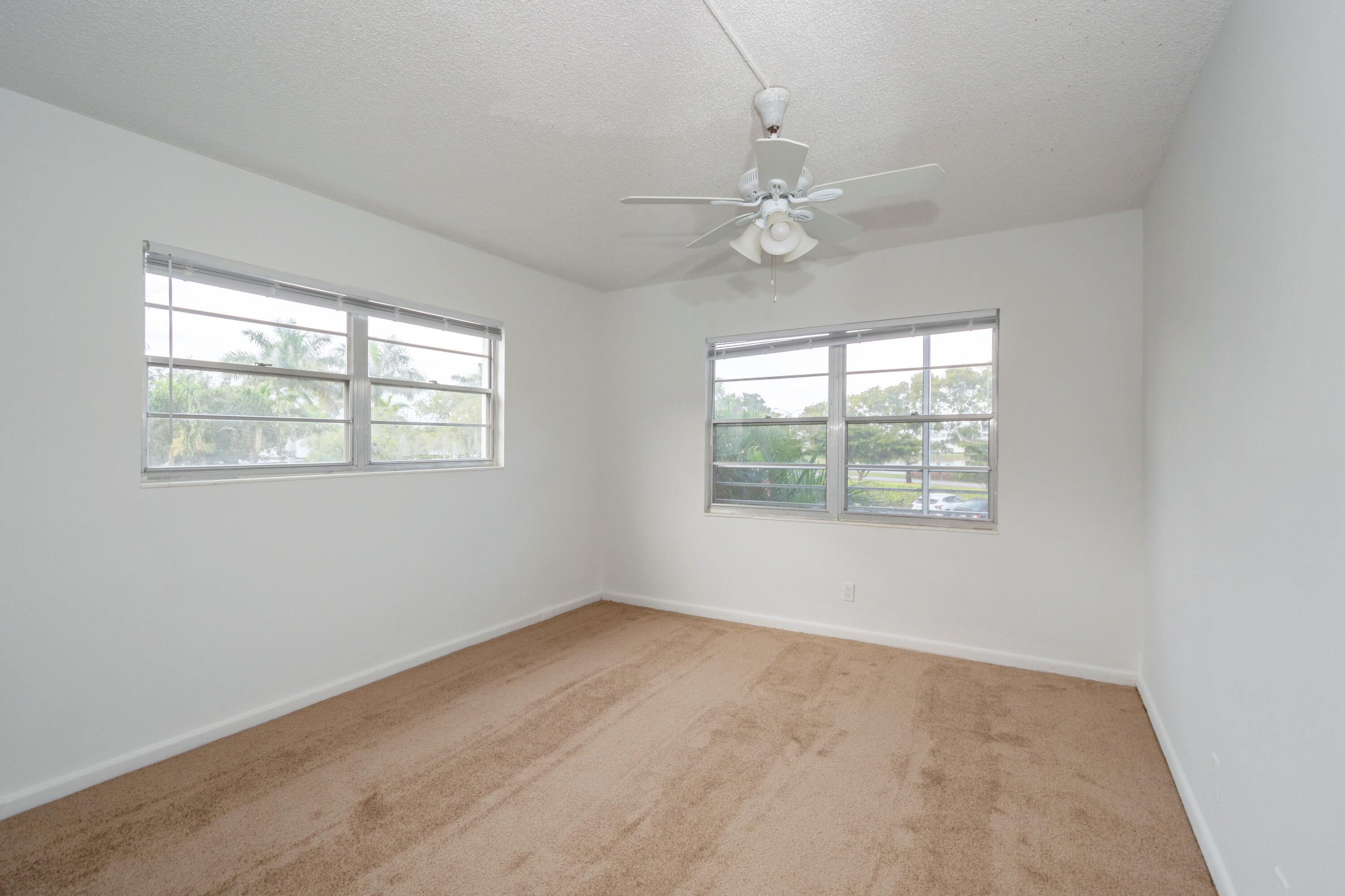 402 Brighton J Boca Raton, FL 33434 - Photo 9 of 24 Guest Bedroom