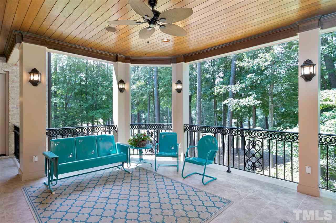 302 Annandale Drive Cary, NC 27511 - Photo 11 of 30 a view of a porch with furniture and a yard