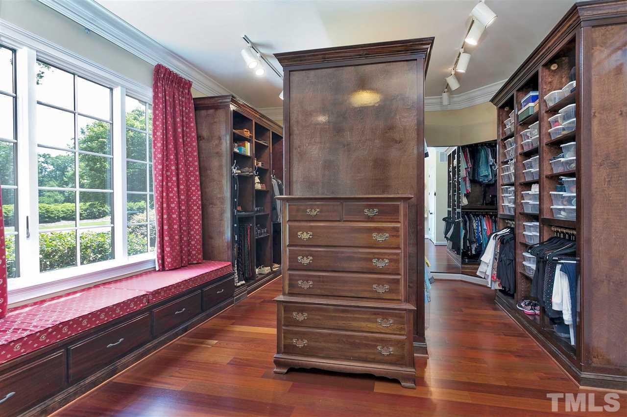 302 Annandale Drive Cary, NC 27511 - Photo 16 of 30 a view of entryway with a large window and wooden floor