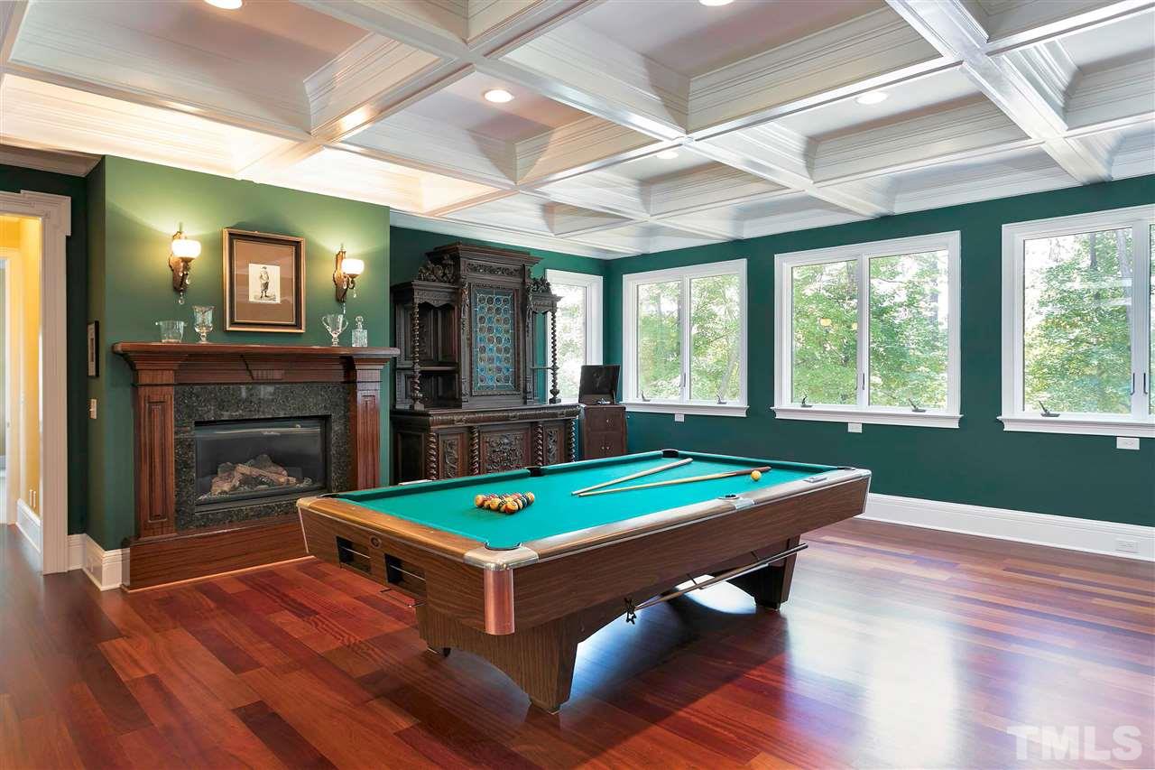 302 Annandale Drive Cary, NC 27511 - Photo 20 of 30 a room with pool table flat screen tv and windows