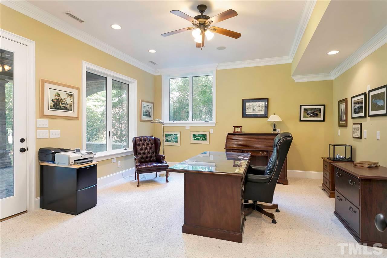 302 Annandale Drive Cary, NC 27511 - Photo 25 of 30 a view of a workspace with furniture and a window
