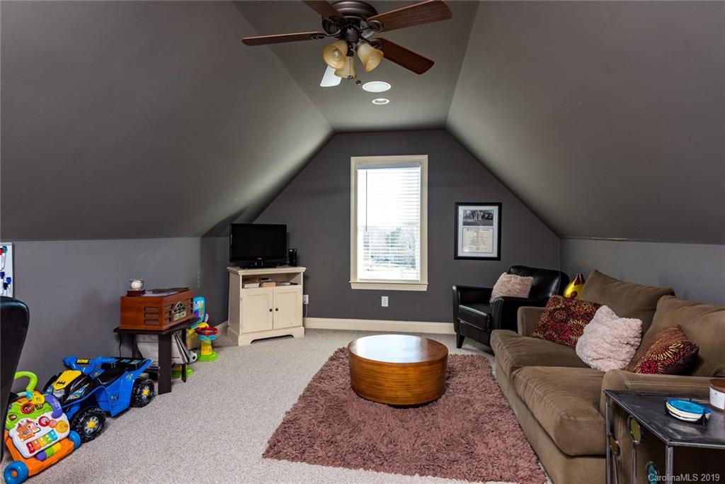 2056 Roadrunner Road Clover, SC 29710 - Photo 18 of 25 a living room with furniture and a window