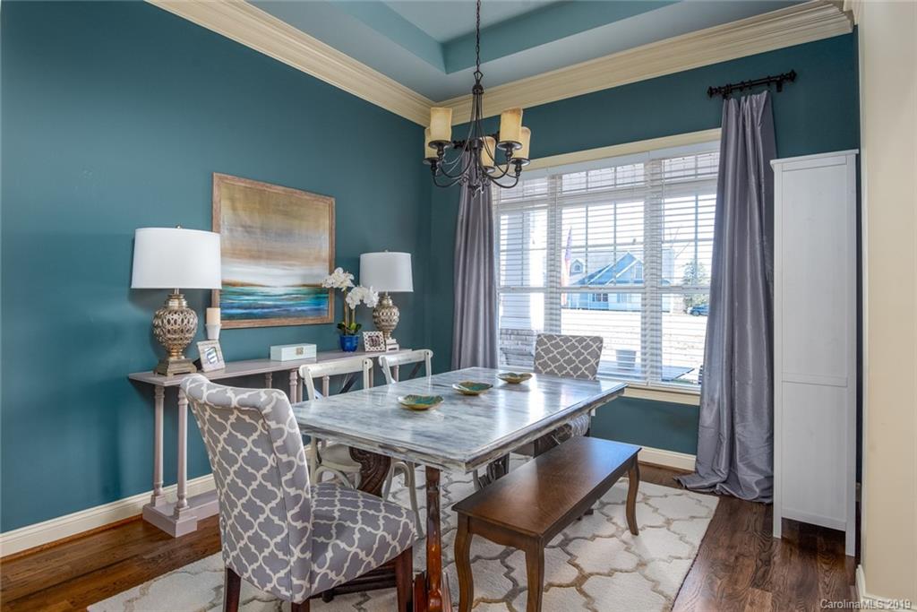 2056 Roadrunner Road Clover, SC 29710 - Photo 6 of 25 a view of a dining room with furniture window and wooden floor