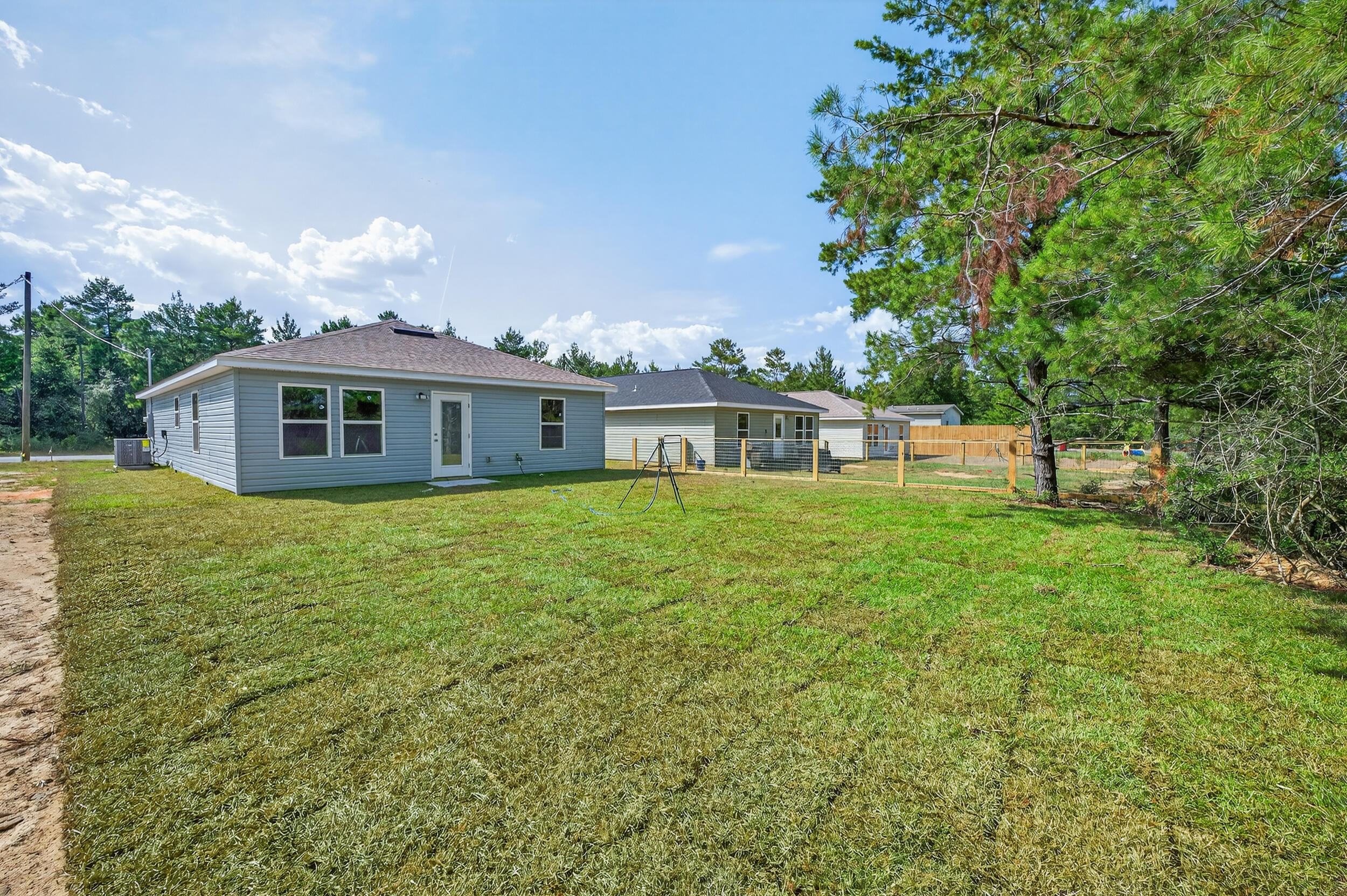 5325 B Kervin Road Crestview, FL 32539 - Photo 44 of 44 a front view of a house with garden
