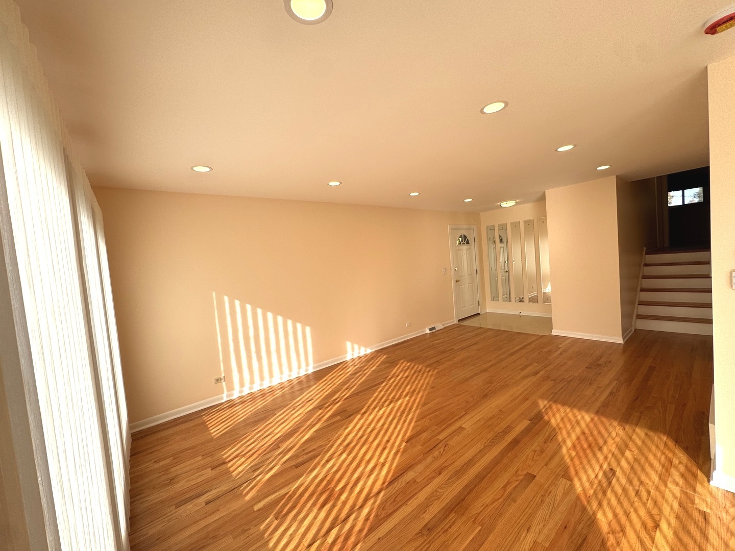 1042 West Central Road Mount Prospect, IL 60056 - Photo 12 of 32 a view of a hallway with wooden floor