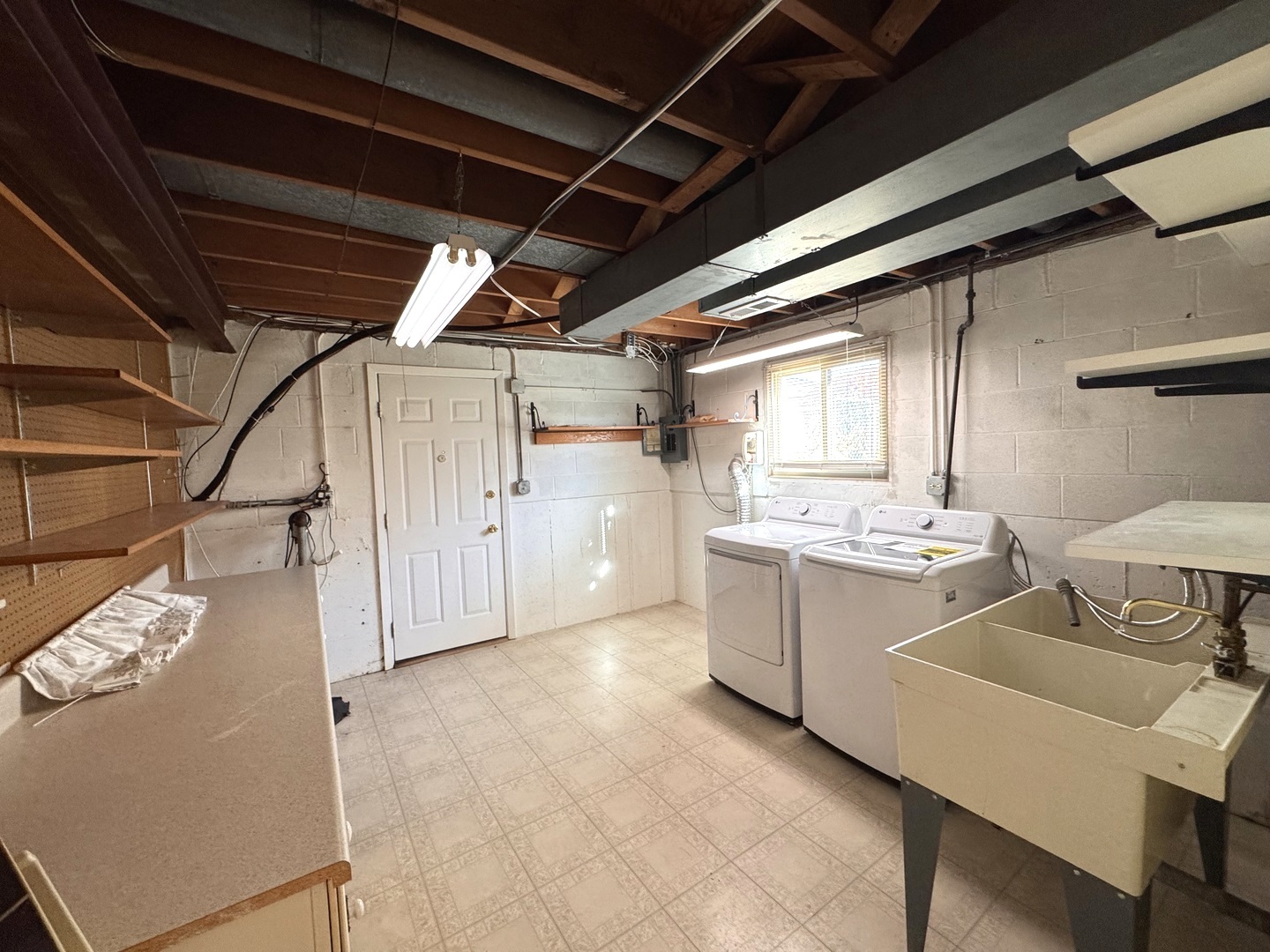 1042 West Central Road Mount Prospect, IL 60056 - Photo 22 of 32 a kitchen with a sink appliances and cabinets