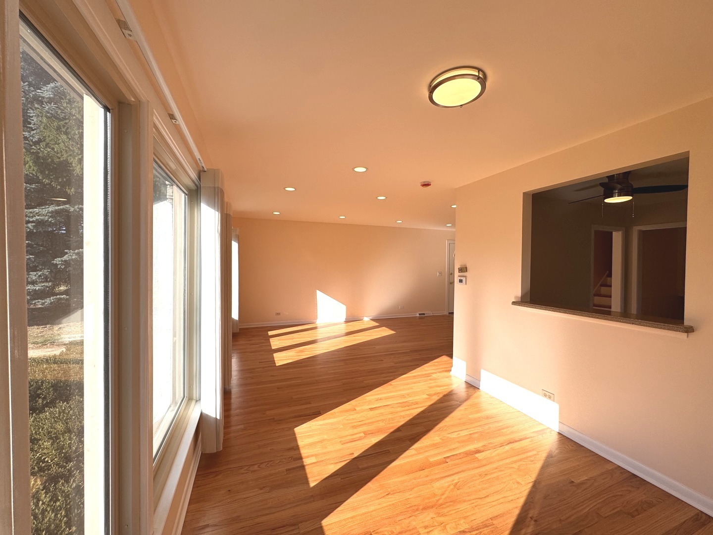 1042 West Central Road Mount Prospect, IL 60056 - Photo 30 of 32 a view of living room with furniture and floor to ceiling window
