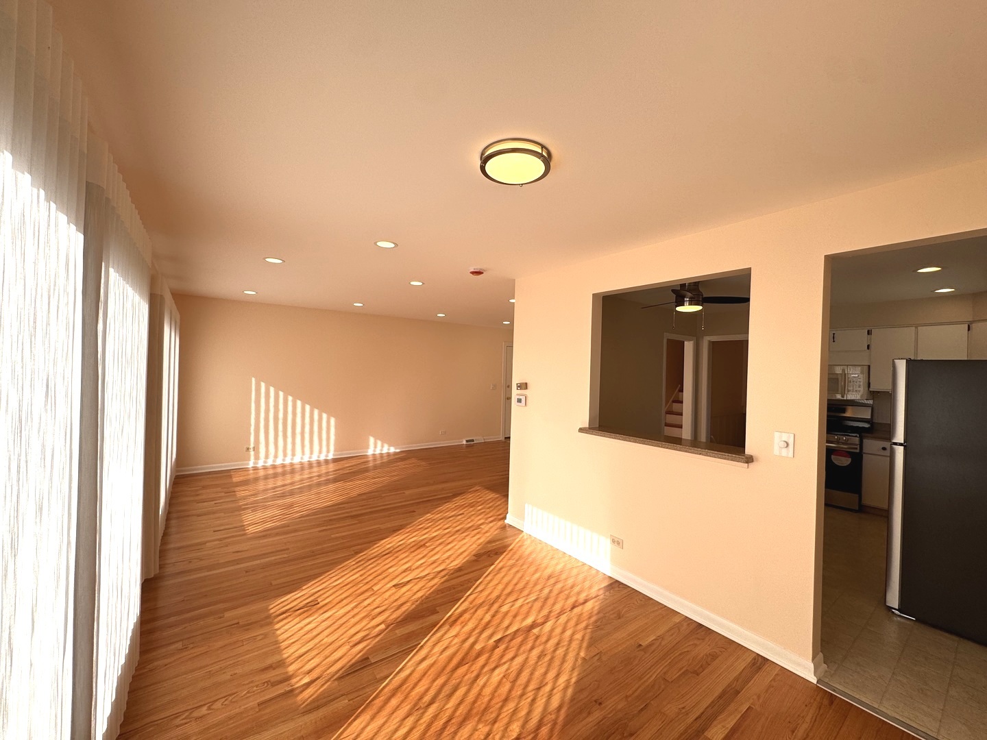 1042 West Central Road Mount Prospect, IL 60056 - Photo 10 of 32 a view of a hallway with wooden floor