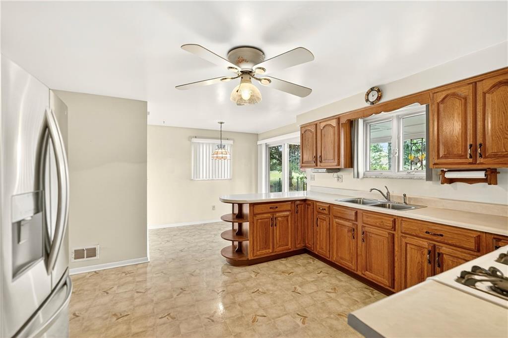 3671 Windover Road Murrysville, PA 15668 - Photo 12 of 42 Eat-in Kitchen w/slider to back yard