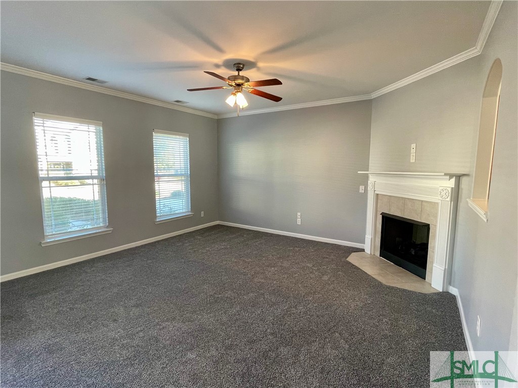 215 Durham Park Way Pooler, GA 31322 - Photo 5 of 41 The living room is spacious and has a gas fireplac