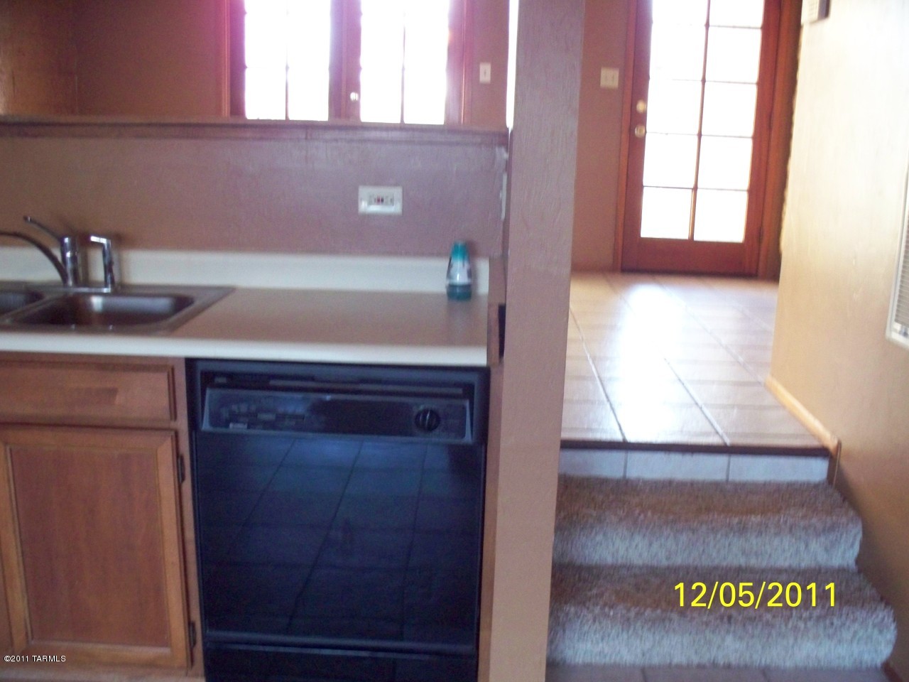 7777 East Golf Links Road, Unit 2205 Tucson, AZ 85730 - Photo 5 of 22 a bathroom with a sink and a mirror