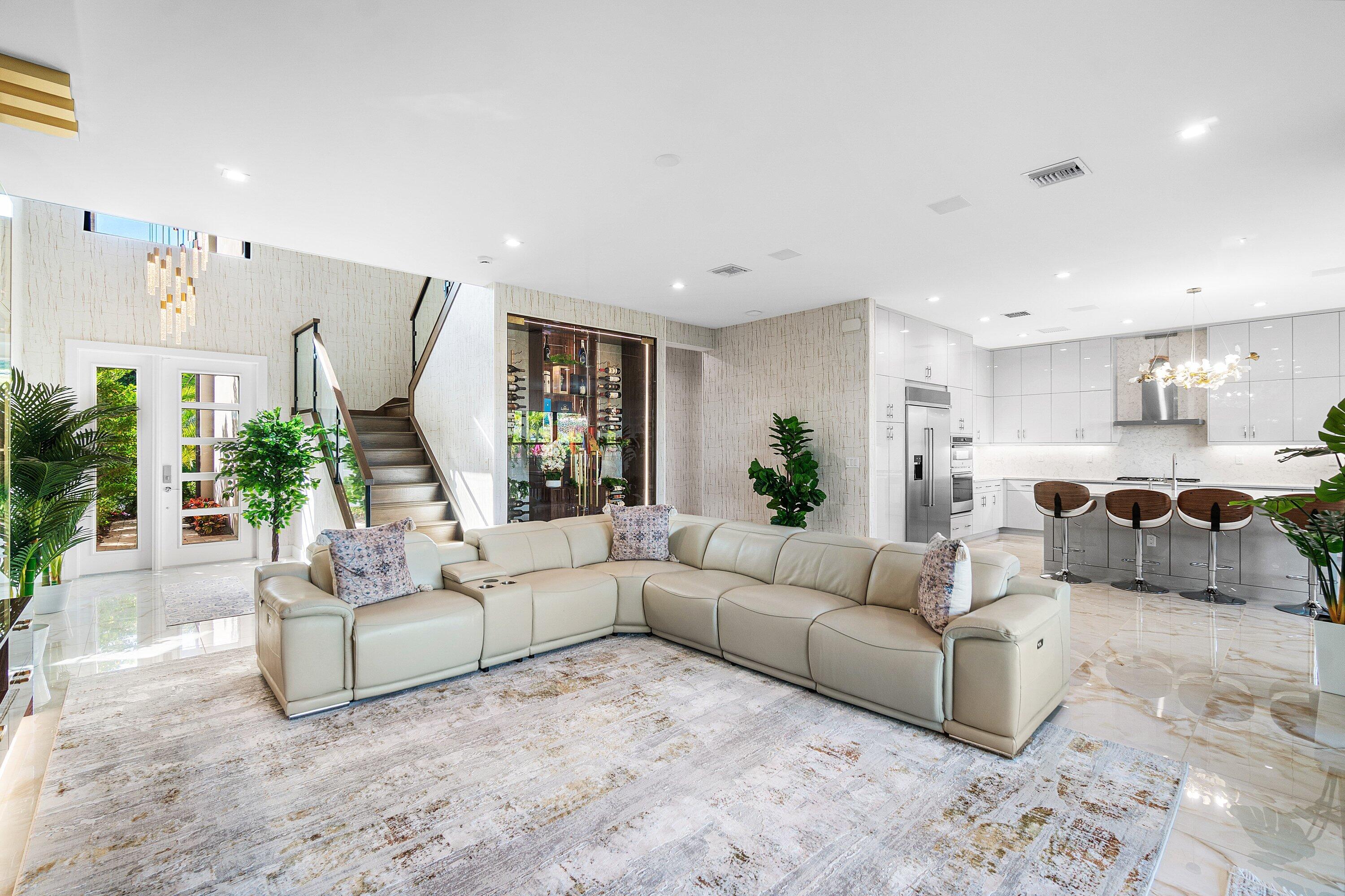 8233 Crystal Downs Avenue Boca Raton, FL 33434 - Photo 8 of 58 a living room with furniture white walls and white walls