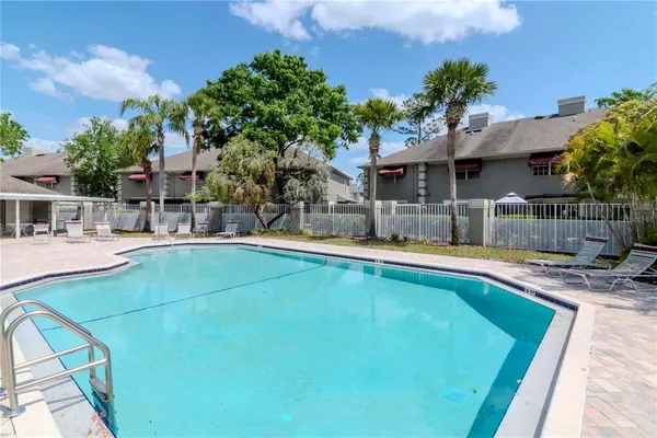 a view of a house with swimming pool