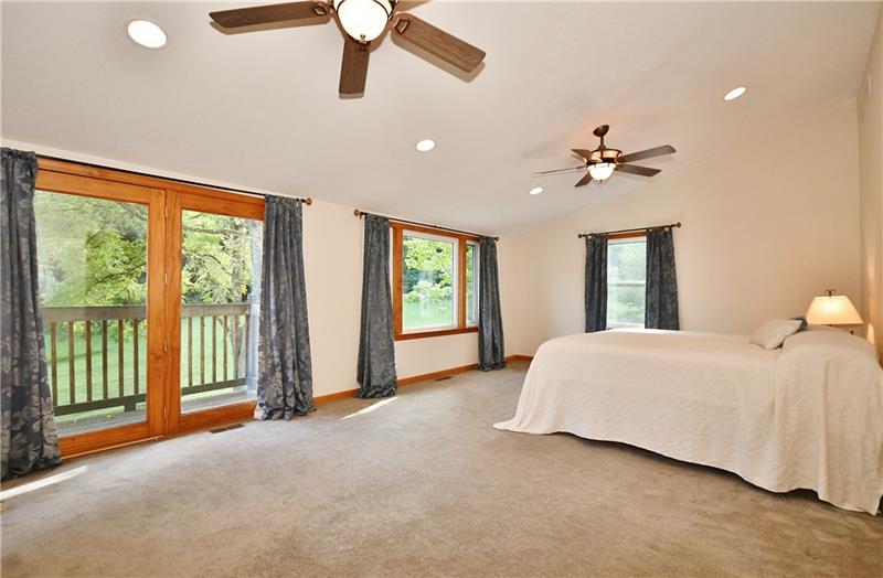 1154 Sugar Run Road Venetia, PA 15367 - Photo 17 of 24 Very large master bedroom with amazing views and a private balcony and vaulted ceiling.