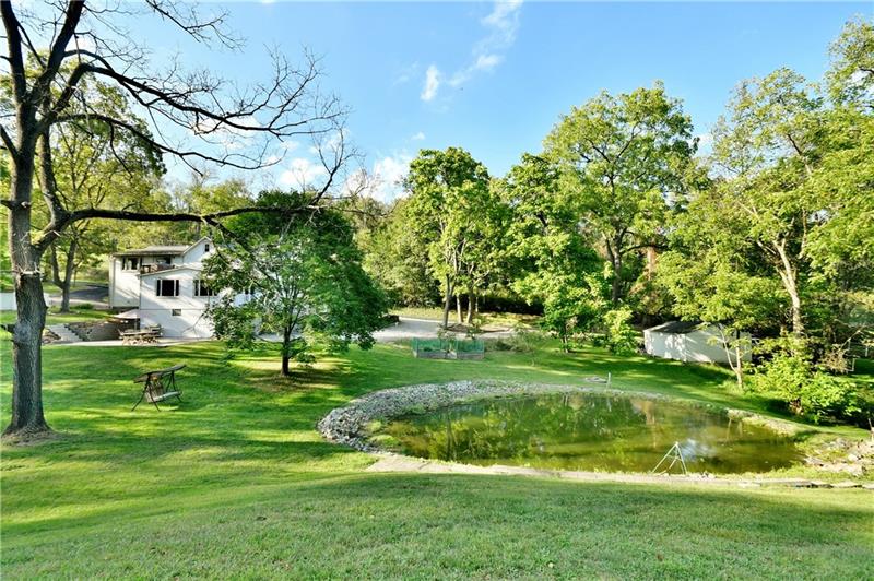 1154 Sugar Run Road Venetia, PA 15367 - Photo 4 of 24 Additional patio around pond to relax next to waterfall.