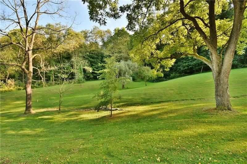 1154 Sugar Run Road Venetia, PA 15367 - Photo 5 of 24 Several acres close to home are cleared and remaining property is wooded, but has some cleared trails.