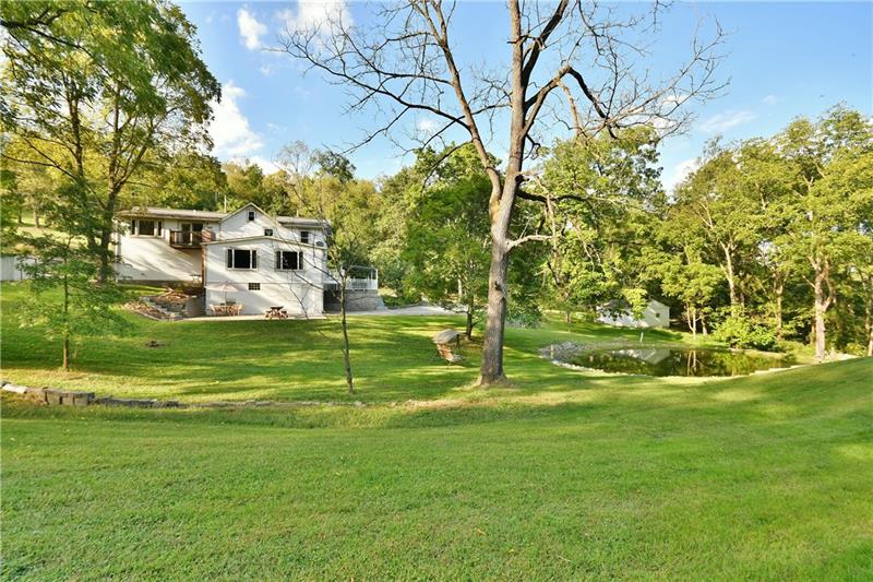 1154 Sugar Run Road Venetia, PA 15367 - Photo 6 of 24 Lots of cleared acreage for all kinds of activity. Look closing and see the oversized patio build with 8" footers in case you wanted to build an addition to house.