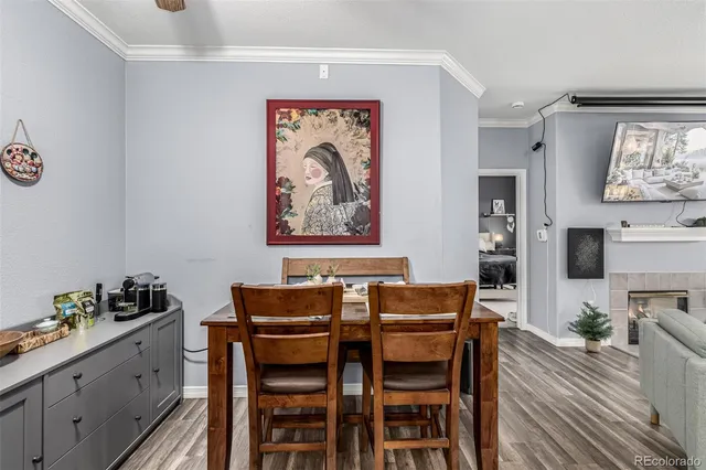 a kitchen with refrigerator a stove and cabinets