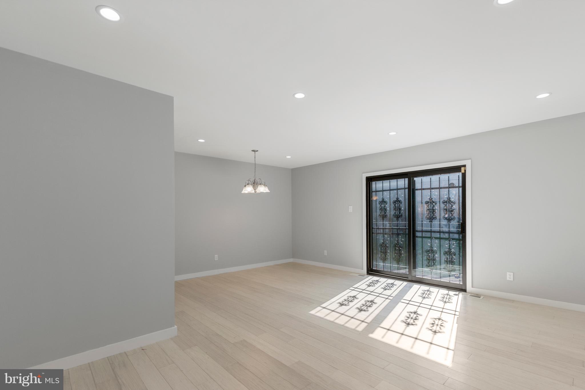 3117 Cherry Road Northeast, Unit 33 Washington, DC 20018 - Photo 11 of 31 Gorgeous Living Room featuring Recess Lighting