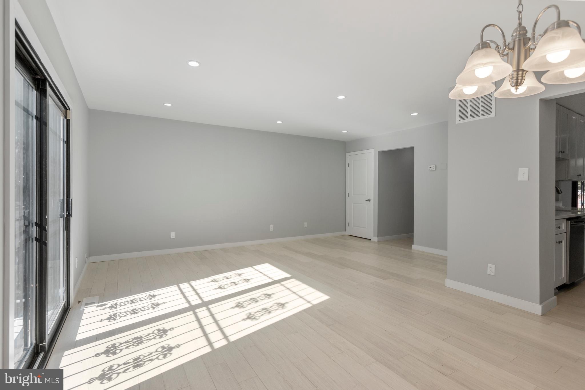 3117 Cherry Road Northeast, Unit 33 Washington, DC 20018 - Photo 13 of 31 Gorgeous Living Room featuring Recess Lighting
