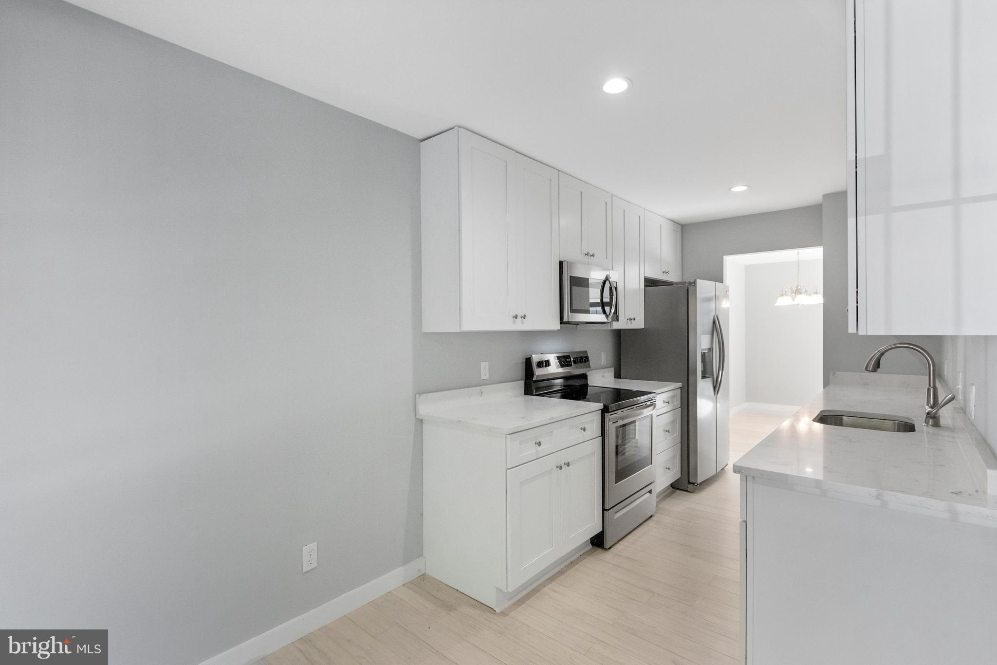 3117 Cherry Road Northeast, Unit 33 Washington, DC 20018 - Photo 4 of 31 Sleek Kitchen