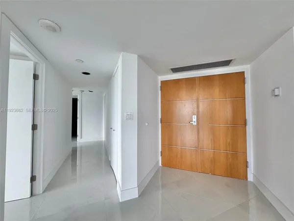 a view of an empty room with window